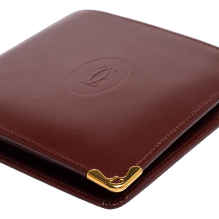 Pre Owned Cartier Maroon Leather Must De Cartier Bifold Wallet