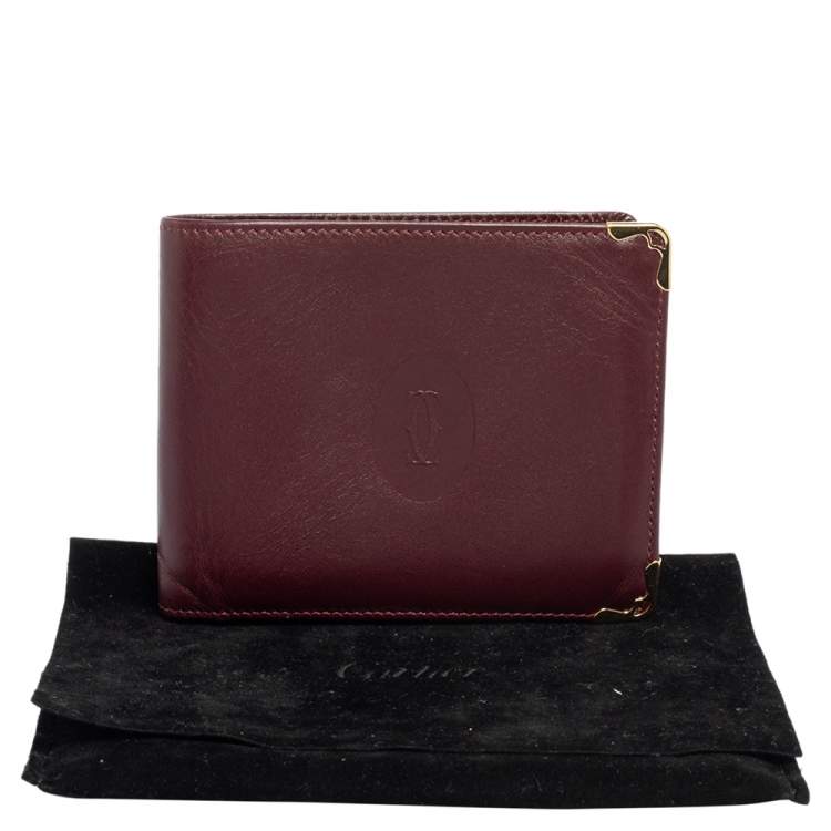 Pre Owned Cartier Burgundy Leather Must De Cartier 6CC Bifold Wallet
