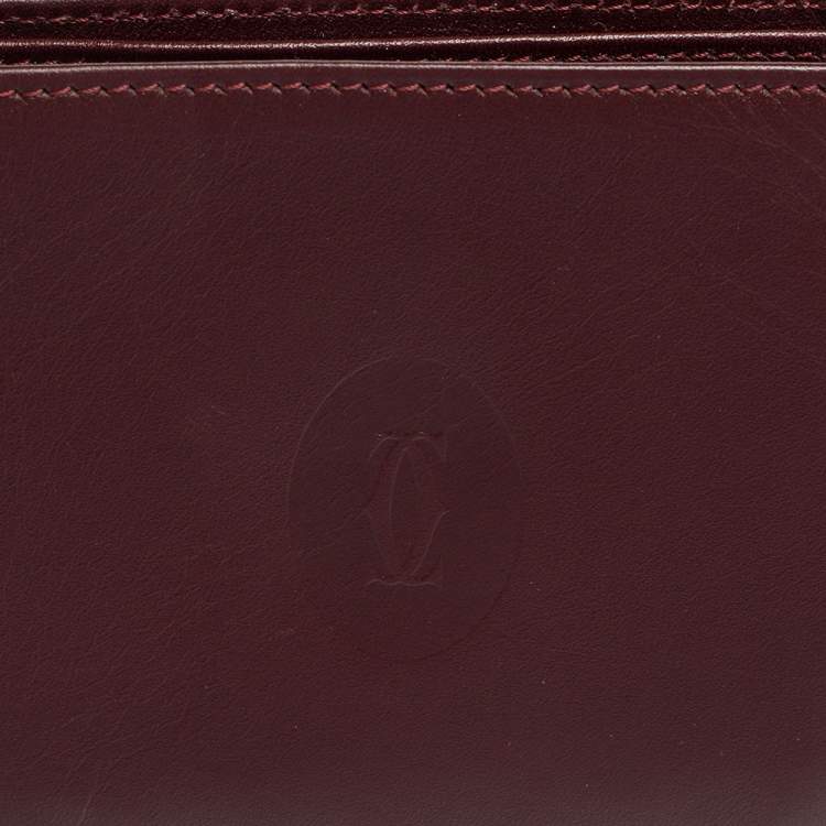 Pre Owned Cartier Burgundy Leather Must De Cartier 6CC Bifold Wallet