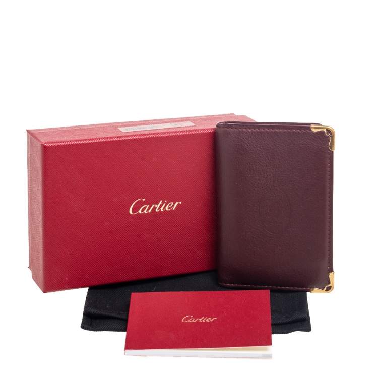 Pre Owned Cartier Burgundy Leather Must de Cartier Bifold Card Holder