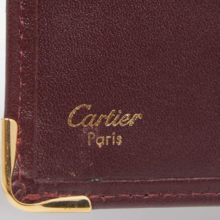 Pre Owned Cartier Maroon Leather Must De Cartier 6CC Bifold Wallet