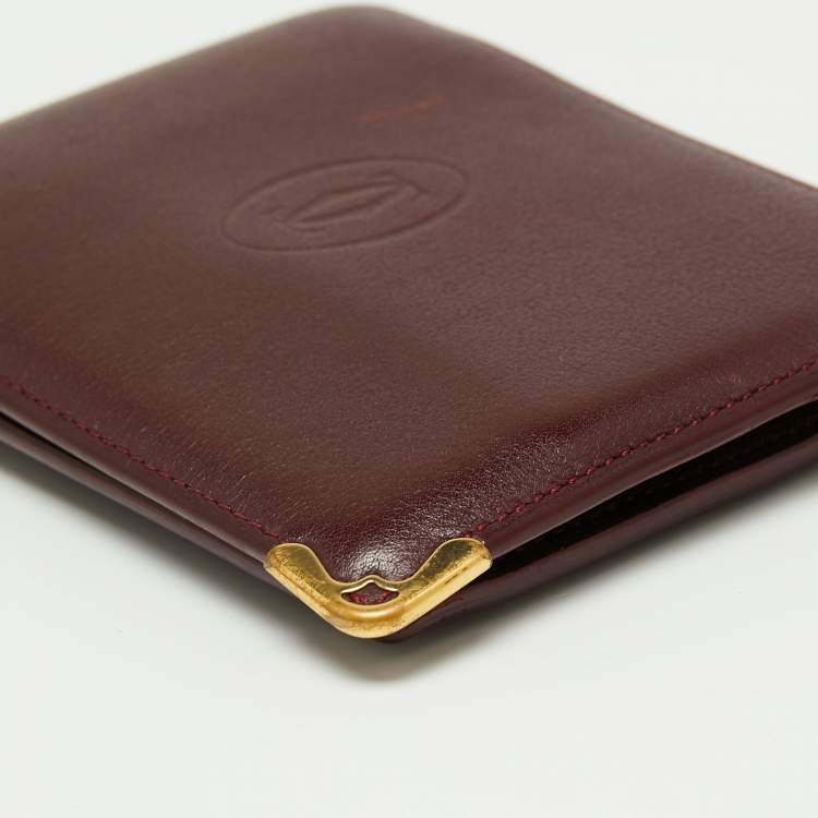 Pre Owned Cartier Burgundy Leather Must De Cartier Bifold Wallet