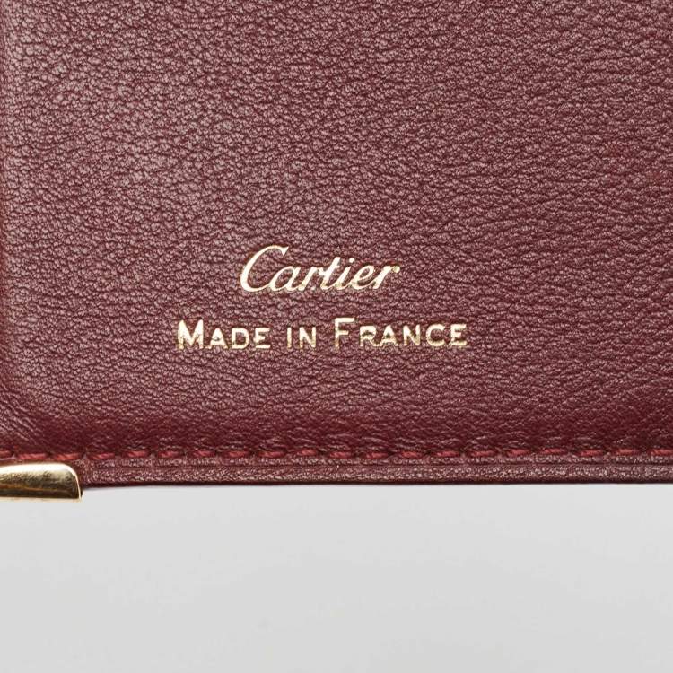 Pre Owned Cartier Burgundy Leather Must de Cartier Bifold Card Holder