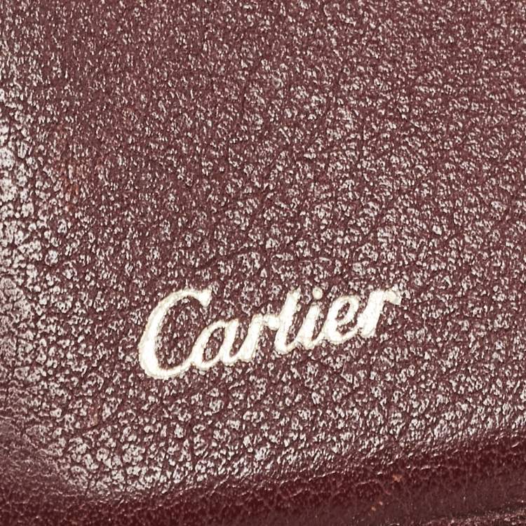 Pre Owned Cartier Burgundy Leather Must De Cartier Bifold Card Holder 