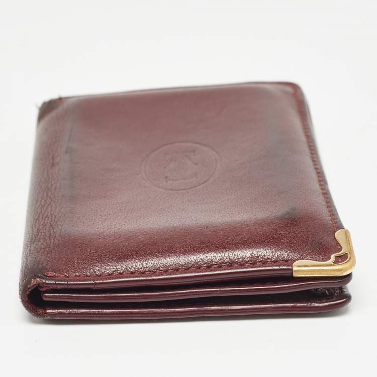 Pre Owned Cartier Burgundy Leather Must De Cartier Bifold Card Holder 