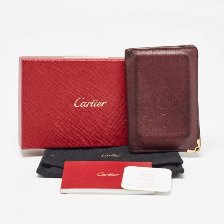 Pre Owned Cartier Burgundy Leather Must De Cartier Bifold Card Holder 