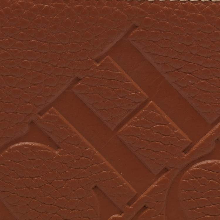Pre Owned CH Carolina Herrera Brown Monogram Embossed Leather Bifold Wallet
