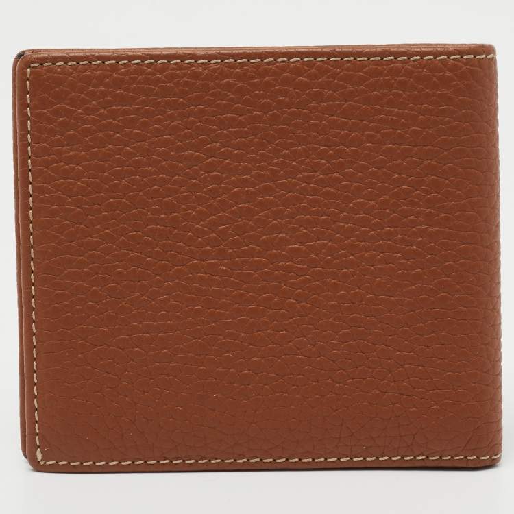 Pre Owned CH Carolina Herrera Brown Monogram Embossed Leather Bifold Wallet