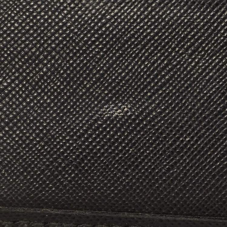 Pre Owned CH Carolina Herrera Black Leather Perforated Logo Bifold Wallet