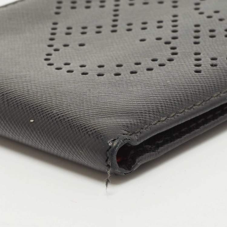 Pre Owned CH Carolina Herrera Black Leather Perforated Logo Bifold Wallet