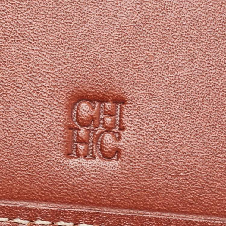 Pre Owned CH Carolina Herrera Tan Monogram Embossed Leather Bifold Wallet