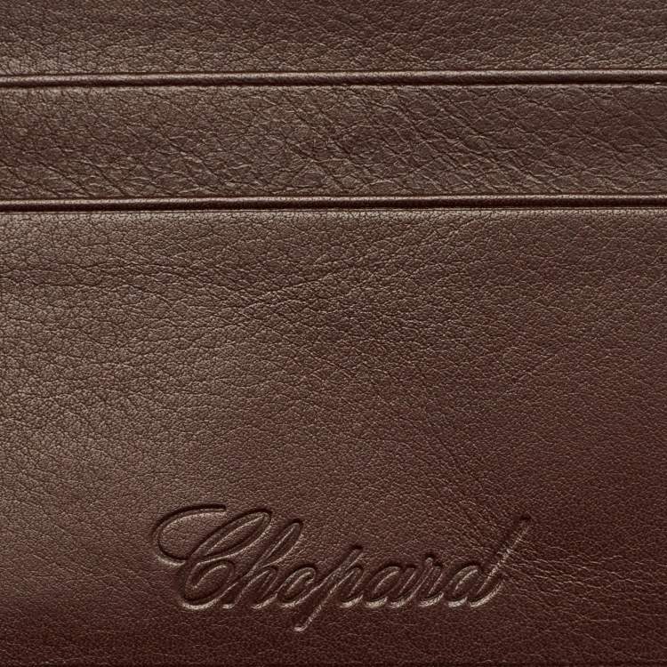 مملوكة مسبقًا محفظة شوپارد بطيّتين جلد بني مع طقم قلم حبر جاف