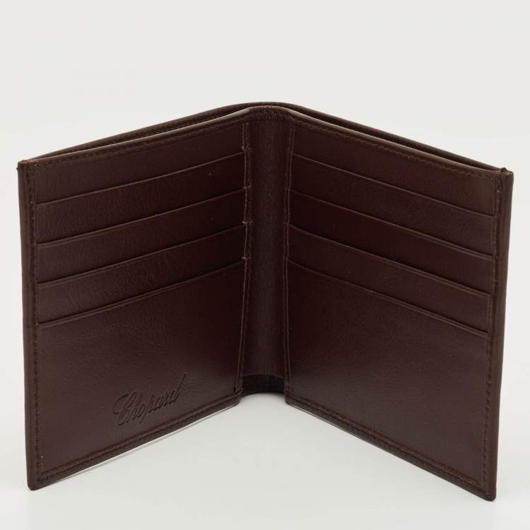 مملوكة مسبقًا محفظة شوپارد بطيّتين جلد بني مع طقم قلم حبر جاف