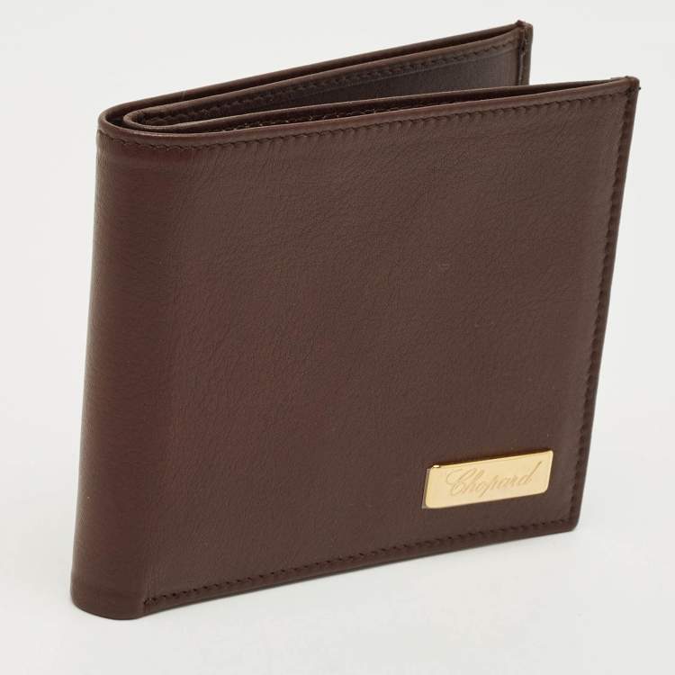 مملوكة مسبقًا محفظة شوپارد بطيّتين جلد بني مع طقم قلم حبر جاف