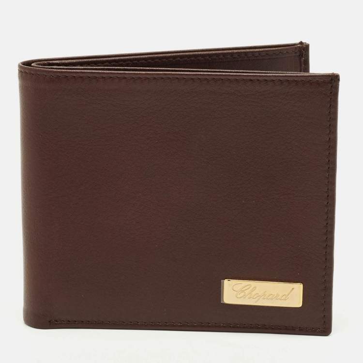 مملوكة مسبقًا محفظة شوپارد بطيّتين جلد بني مع طقم قلم حبر جاف