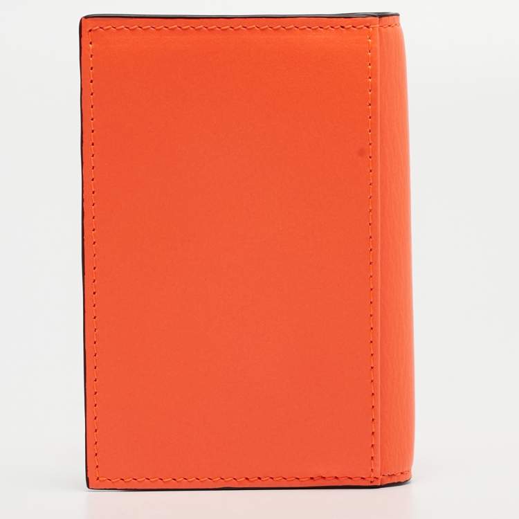 Pre Owned Christian Louboutin Neon Orange Leather Spikes Sifnos Wallet 