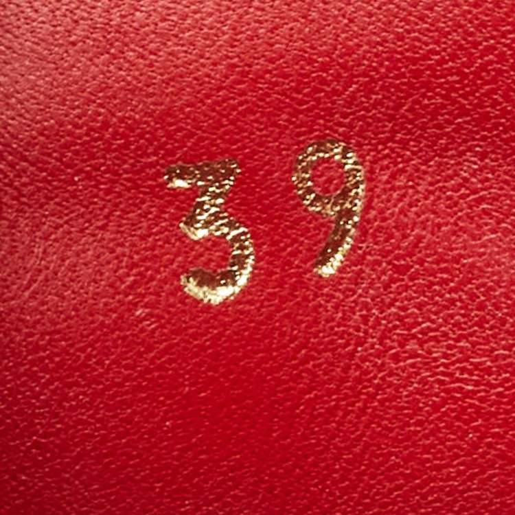 Pre Owned Christian Louboutin Black Leather and Fabric Red Runner Studded Low Top Sneakers Size 39