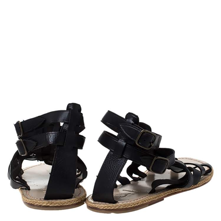 مملوكة مسبقًا Christian Louboutin Black Leather Nuria Gladiator Flat Sandals Size 41