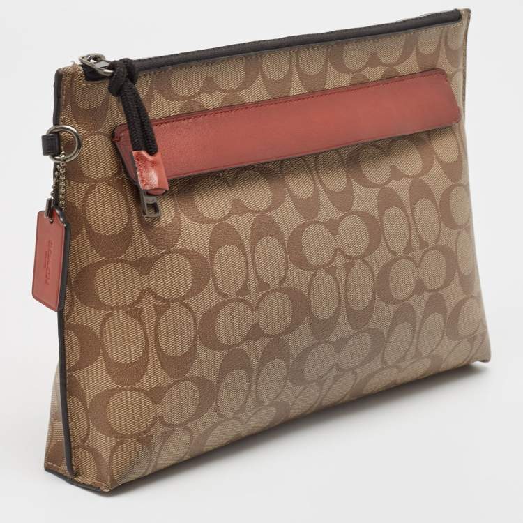 Pre Owned Coach Beige Signature Coated Canvas and Leather Carryall Pouch 