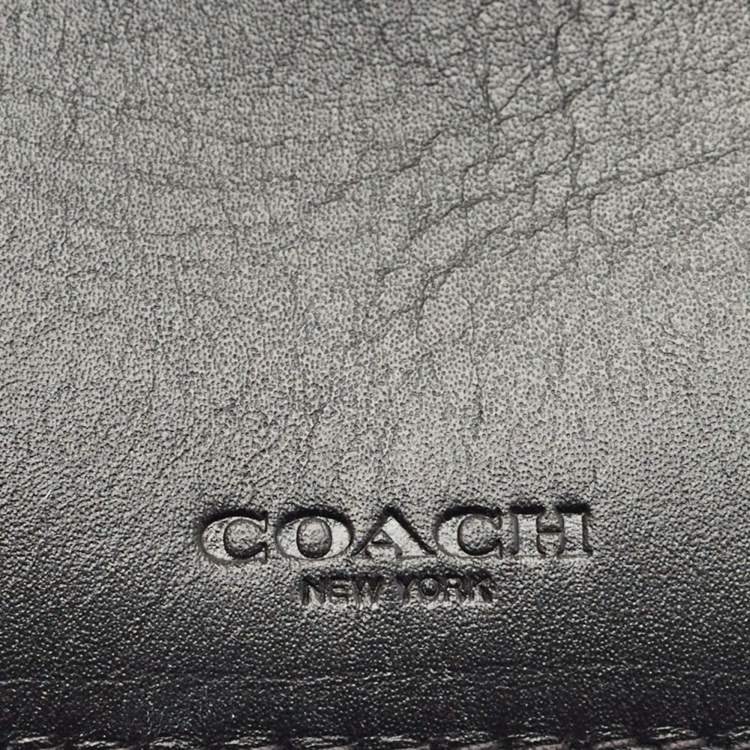 Pre Owned Coach Black Signature Embossed Leather Bifold Wallet