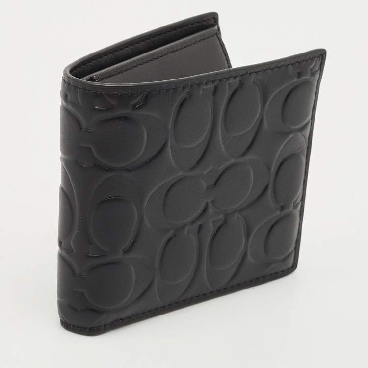 Pre Owned Coach Black Signature Embossed Leather Bifold Wallet