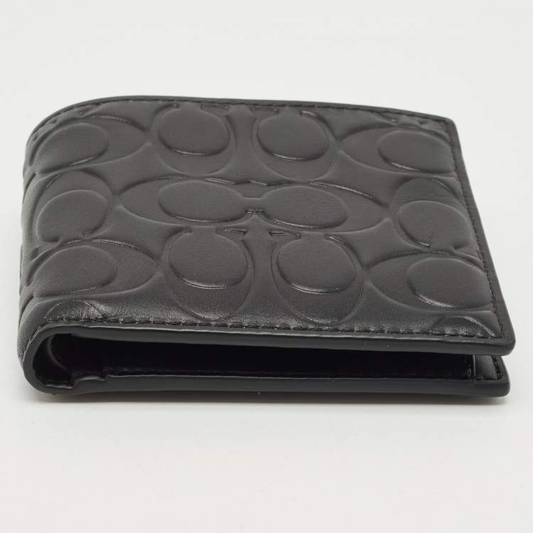 Pre Owned Coach Black Signature Embossed Leather Bifold Wallet