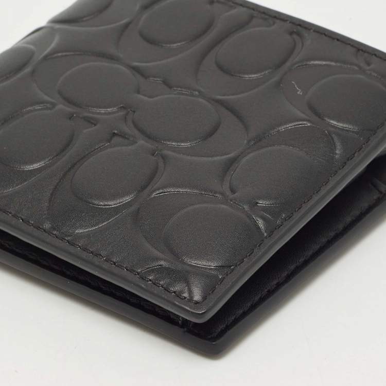 Pre Owned Coach Black Signature Embossed Leather Bifold Wallet