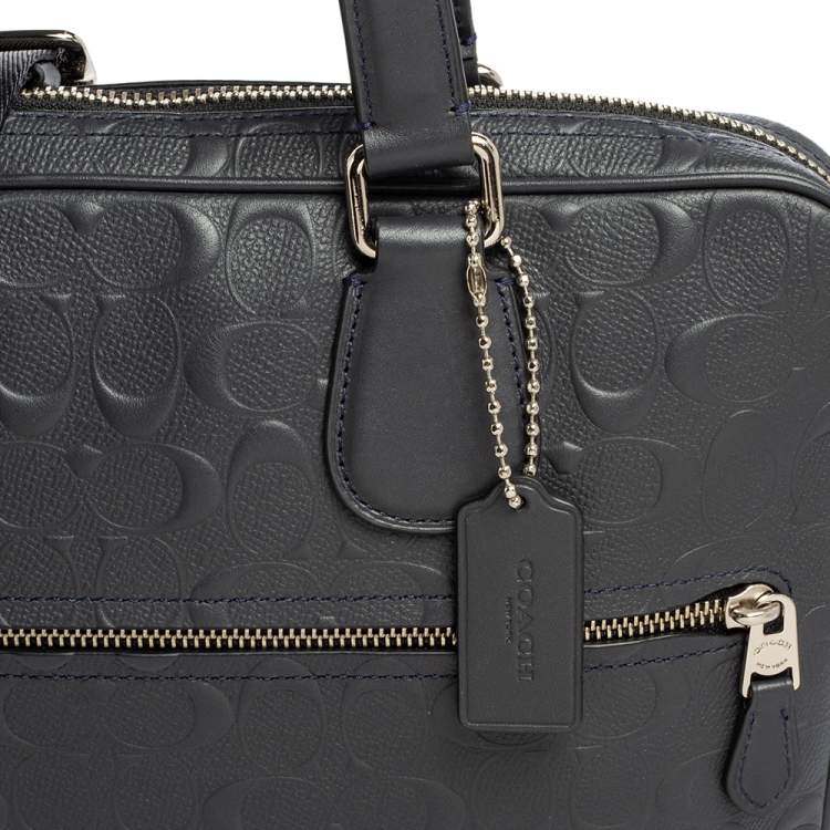 Pre Owned Coach Navy Blue Signature Embossed Leather Hudson Briefcase 