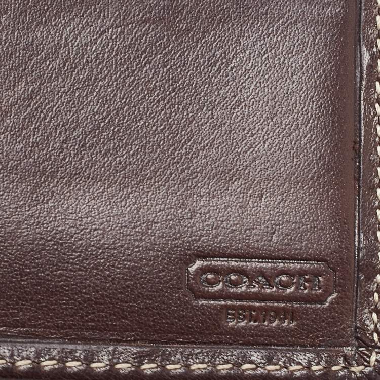Pre Owned Coach Beige/Brown Signature Canvas Compact Bifold Wallet    