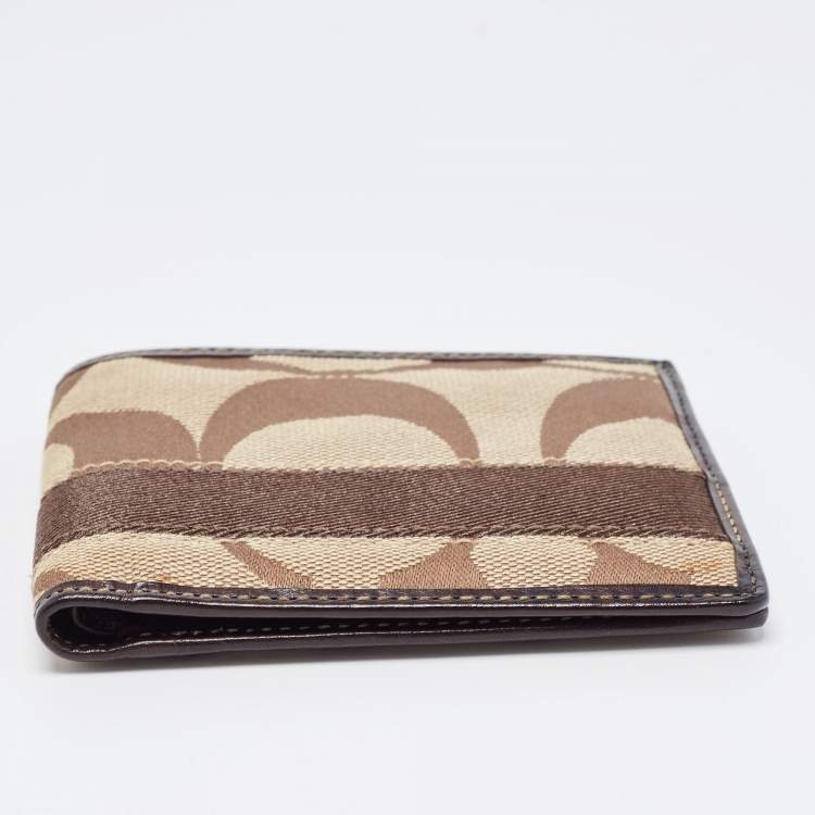 Pre Owned Coach Beige/Brown Signature Canvas Compact Bifold Wallet    