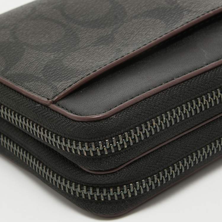 Pre Owned Coach Grey/Black Signature Canvas and Leather Zip Wristlet Pouch