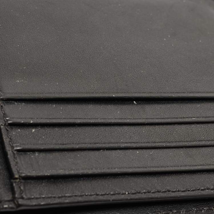 Pre Owned Coach Black Signature Embossed Leather Bifold Wallet