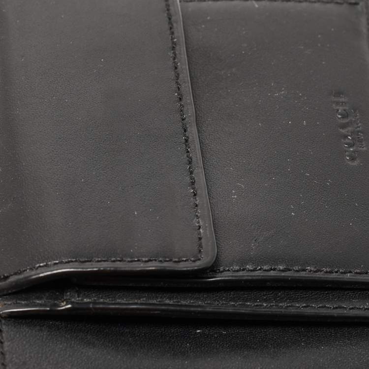 Pre Owned Coach Black Signature Embossed Leather Bifold Wallet