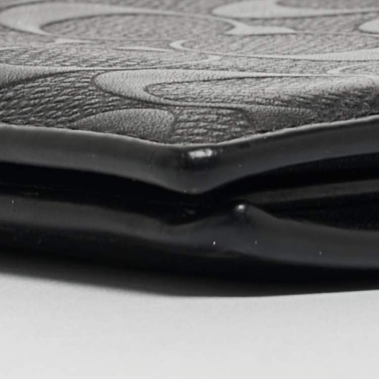Pre Owned Coach Black Signature Embossed Leather Bifold Wallet