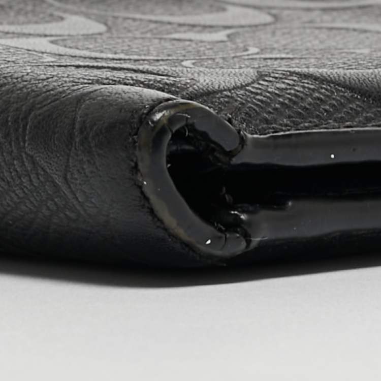 Pre Owned Coach Black Signature Embossed Leather Bifold Wallet