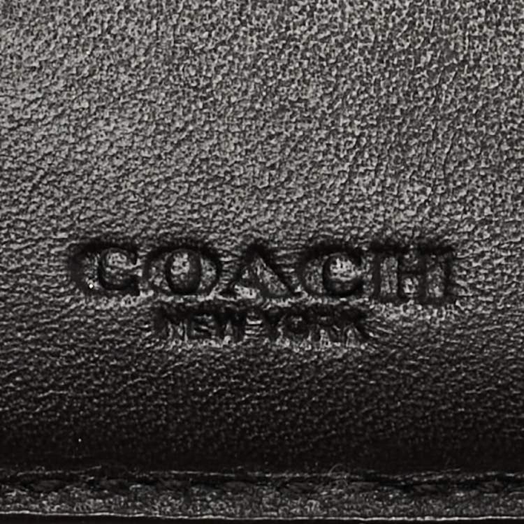 Pre Owned Coach Black Signature Embossed Leather Bifold Wallet