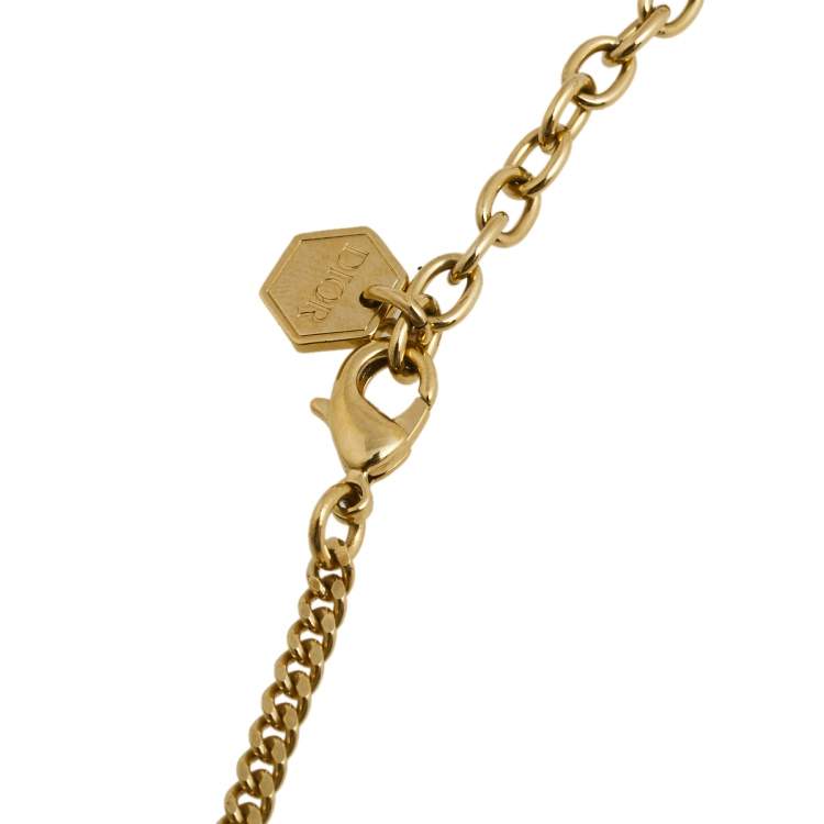 Pre Owned Dior Gold Tone Crystal Embellished Logo Pendant Necklace