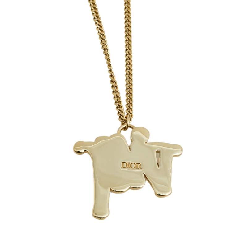 Pre Owned Dior Gold Tone Crystal Embellished Logo Pendant Necklace