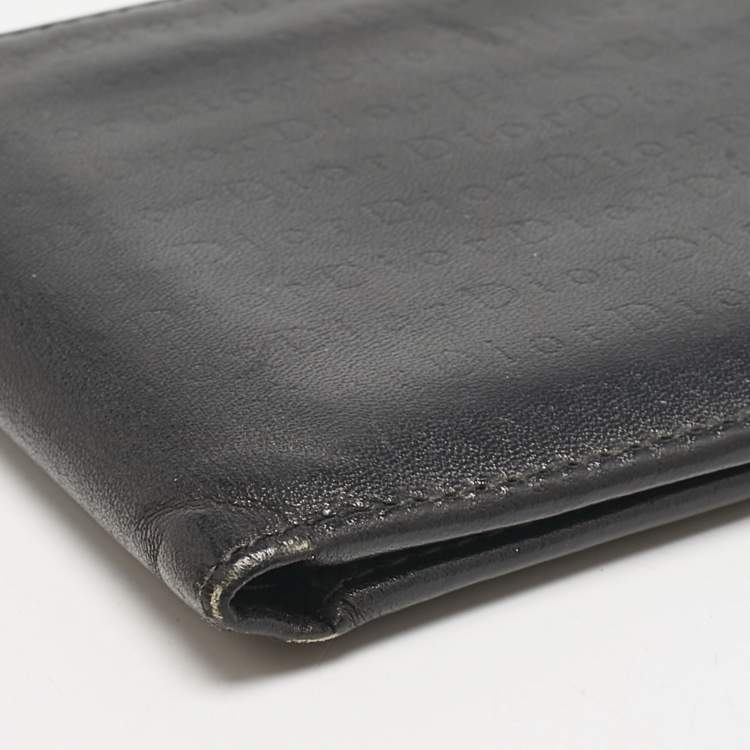 Pre Owned Dior Black Logo Embossed Leather Bifold Wallet