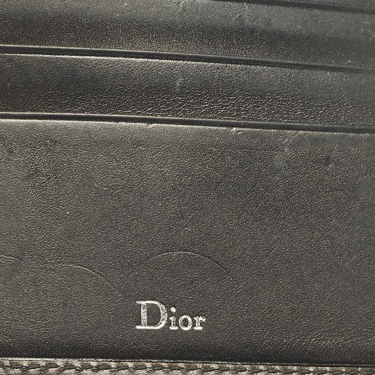Pre Owned Dior Black Logo Embossed Leather Bifold Wallet