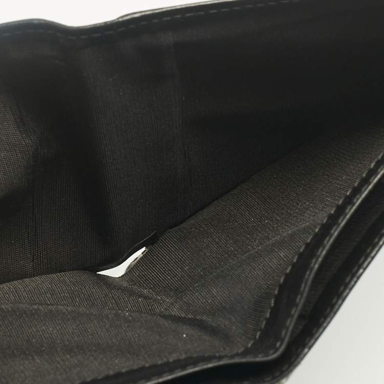 Pre Owned Dior Black Logo Embossed Leather Bifold Wallet