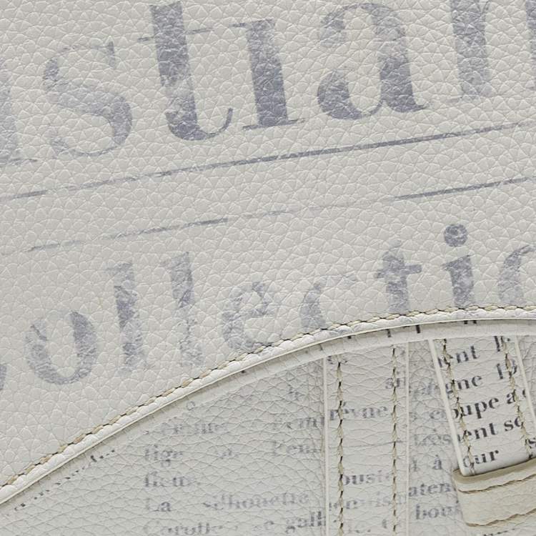 Pre Owned Dior x Daniel Arsham White Newspaper Print Leather Saddle Crossbody Bag