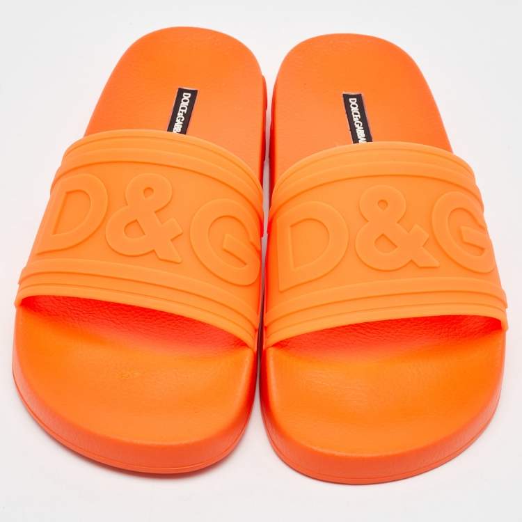 Pre Owned Dolce & Gabbana Neon Orange Rubber Logo Flat Slides Size 41