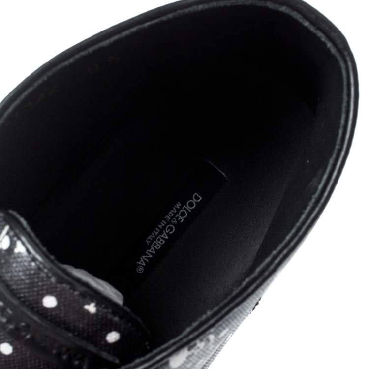 Pre Owned Dolce & Gabbana Black Skull and Cross Bone Print Canvas High Top Sneakers Size 43.5