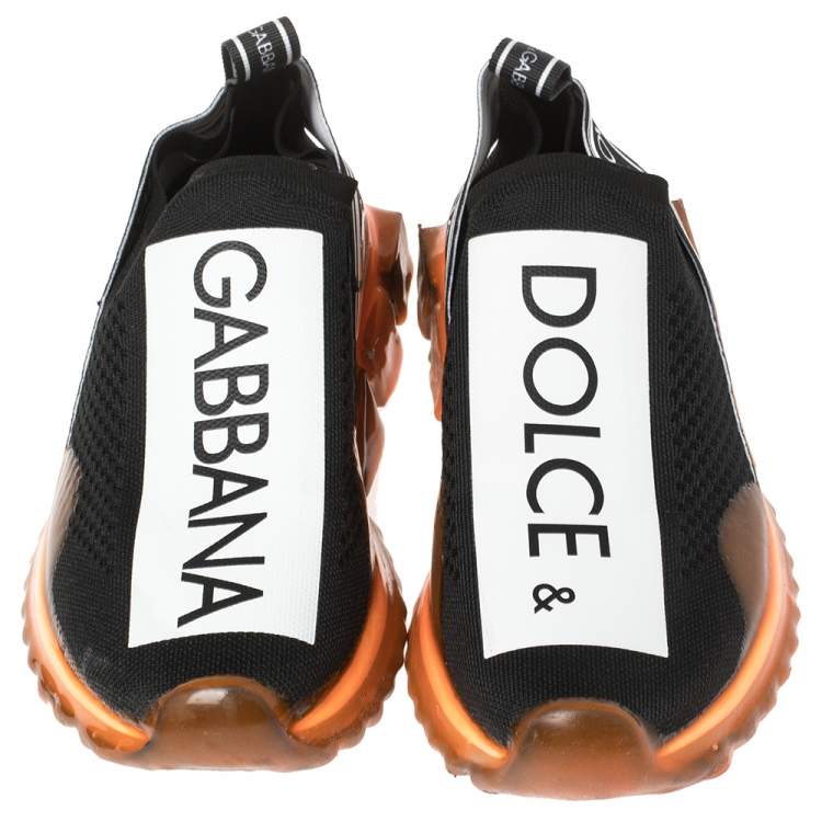 مملوكة مسبقًا Dolce & Gabbana Black/Orange Stretch Jersey Logo Print Slip On Sneakers Size 39