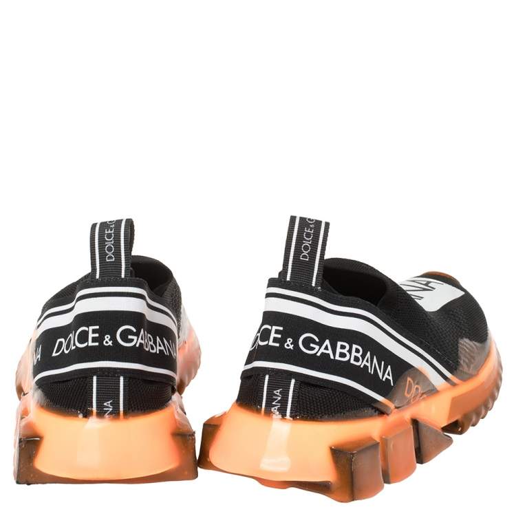 مملوكة مسبقًا Dolce & Gabbana Black/Orange Stretch Jersey Logo Print Slip On Sneakers Size 39
