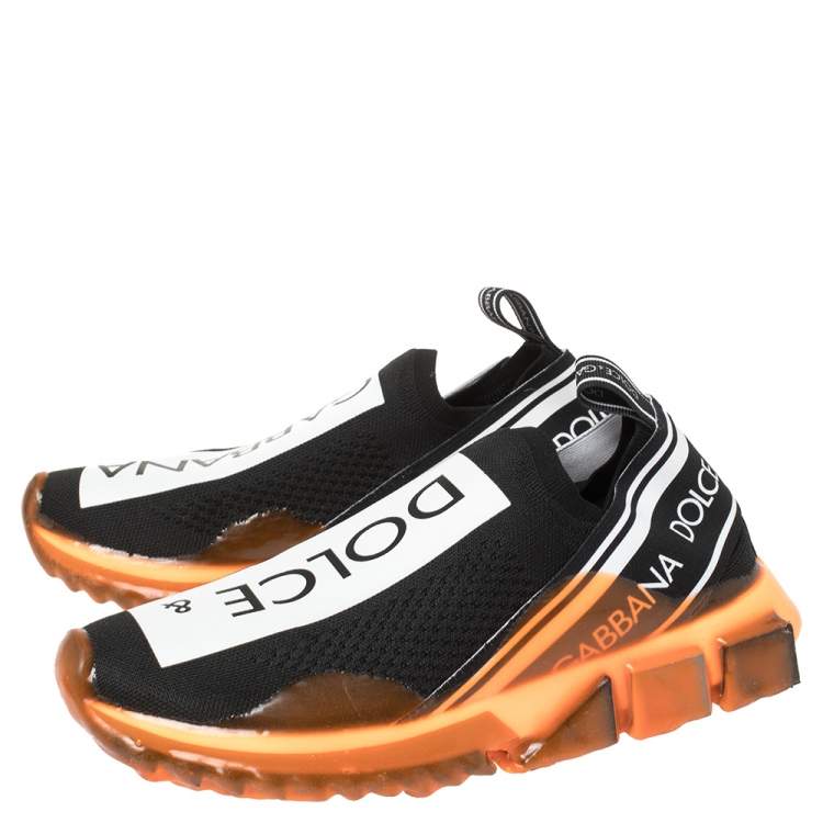مملوكة مسبقًا Dolce & Gabbana Black/Orange Stretch Jersey Logo Print Slip On Sneakers Size 39