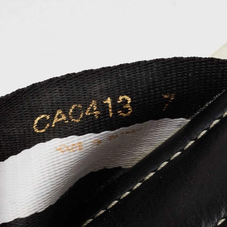 Pre Owned Dolce & Gabbana Black/White Canvas Cross Strap Flat Slides Size 41