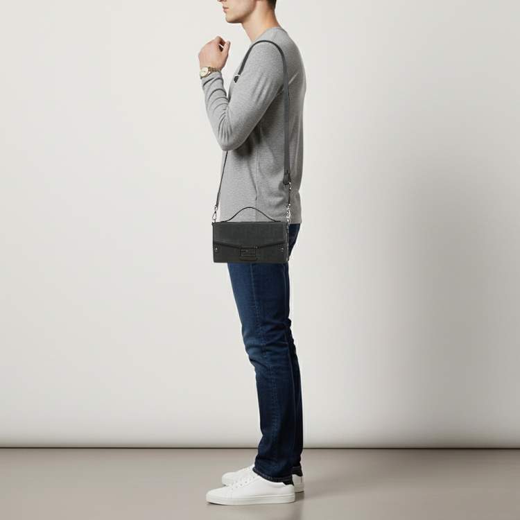 Pre Owned Fendi Soft Trunk Baguette Black FF Embossed Leather Bag