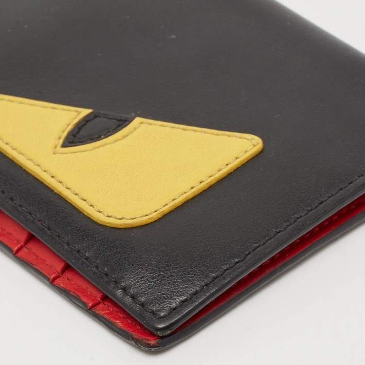 Pre Owned Fendi Black/Yellow Leather Monster Continental Wallet
